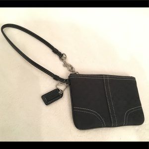 Cute black Coach wristlet.